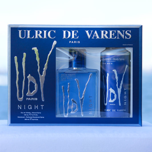 Ulric De Varens UDV Night Gift Set men's perfume 3.4 EDT and deodorant 6.8 oz in front of beach