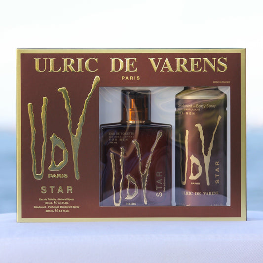 Ulric De Varens UDV Star Gift Set men's perfume 3.4 EDT and deodorant 6.8 oz in front of beach