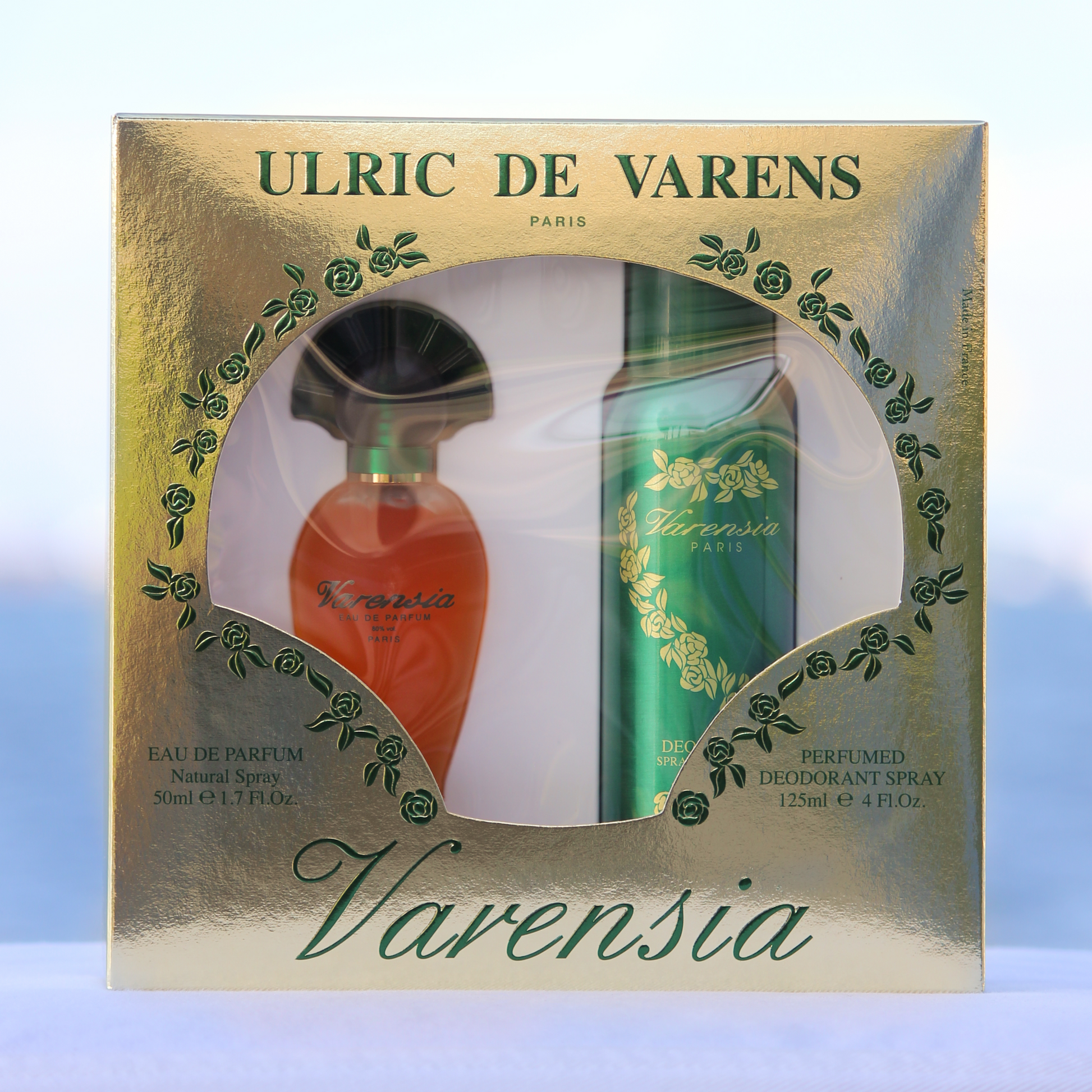 Ulric De Varens Varensia Gift Set women's perfume 1.7 EDP and deodorant 4 oz in front of beach