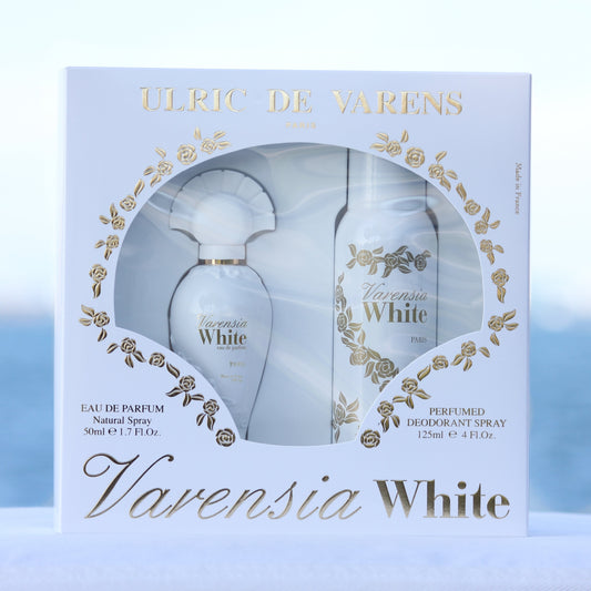 Ulric De Varens Varensia White Gift Set women's perfume 1.7 EDP and deodorant 4 oz in front of beach