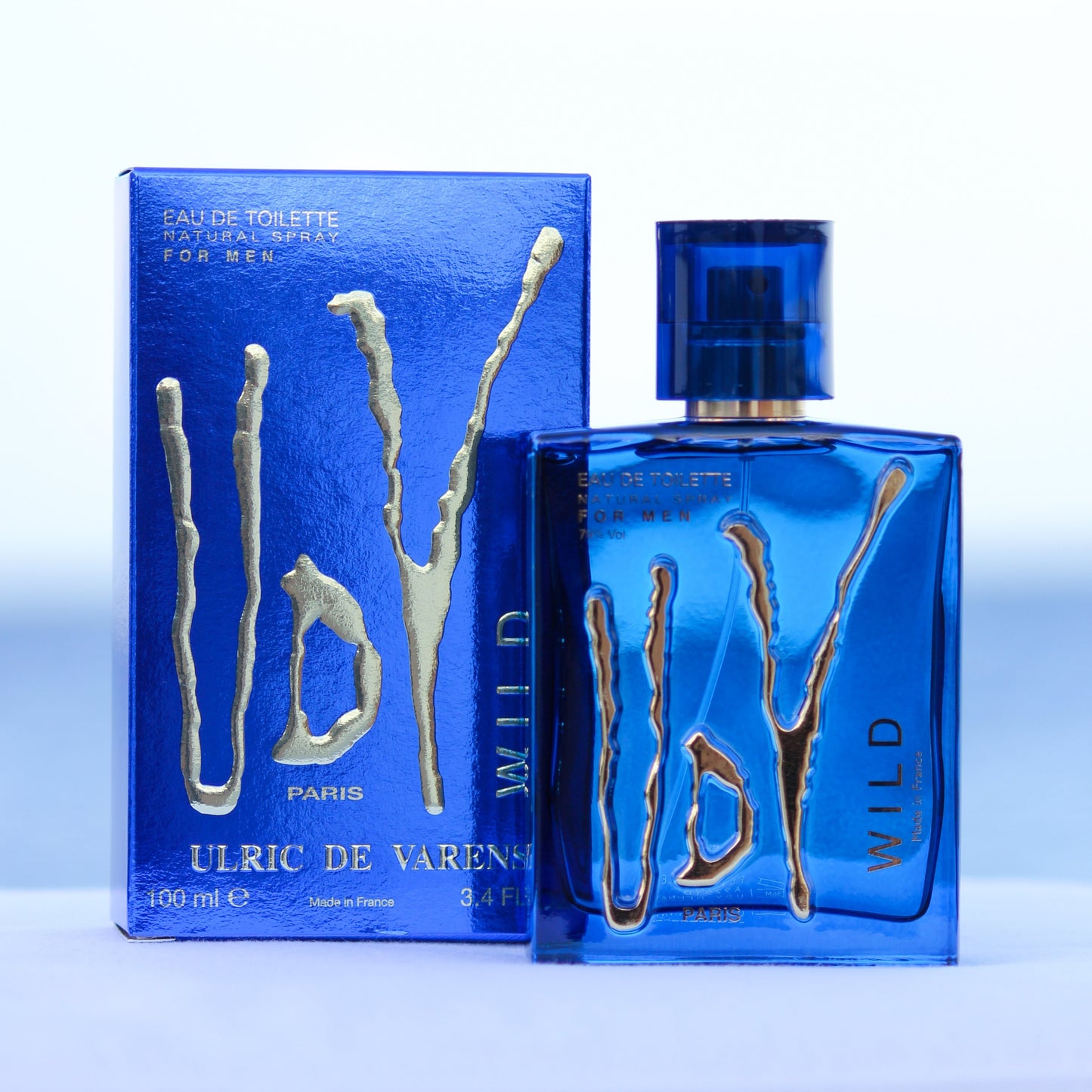 Ulric De Varens UDV Wild men's perfume 3.4 EDT in front of beach